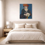 Gallery-wrapped canvas print of Henri Matisse's Madras Rouge hanging above a bed in a bedroom