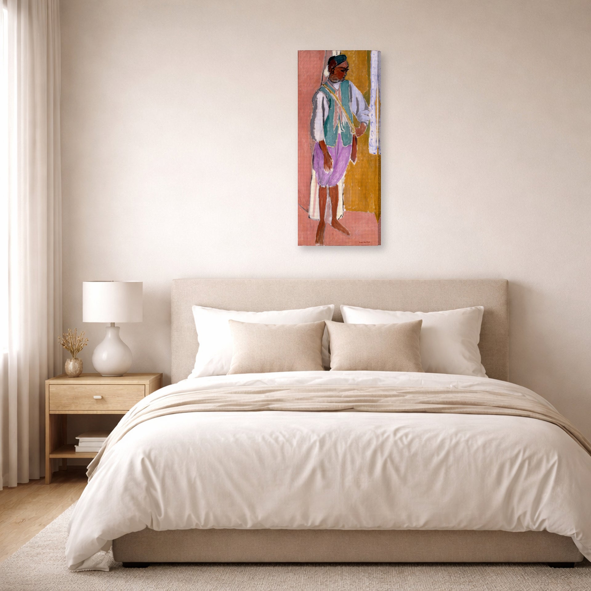 Gallery-wrapped canvas print of Henri Matisse's Moroccan Amido hanging above a bed in a bedroom