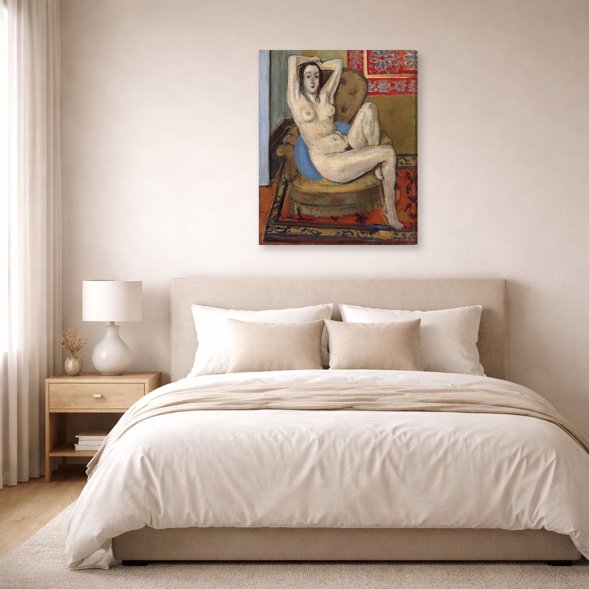 Gallery-wrapped canvas print of Henri Matisse's Nude on Blue Cushion hanging above a bed in a bedroom