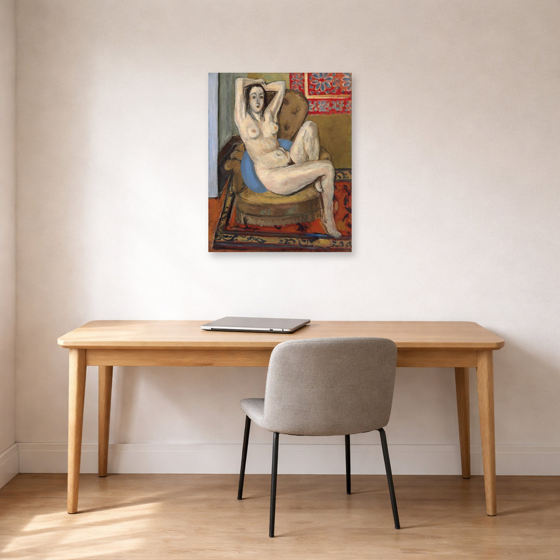 Unframed poster print of Henri Matisse's Nude on Blue Cushion displayed in a home office