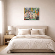 Gallery-wrapped canvas print of Henri Matisse's Odalisque Au Fauteuil Noir hanging above a bed in a bedroom