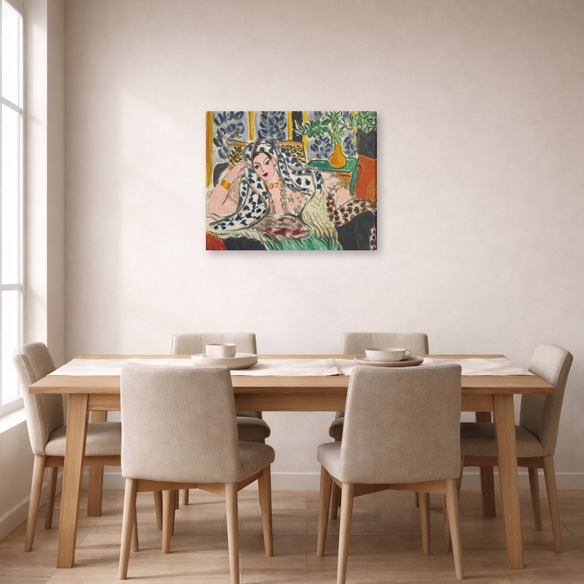 Gallery-wrapped canvas print of Henri Matisse's Odalisque Au Fauteuil Noir hanging on a dining room wall