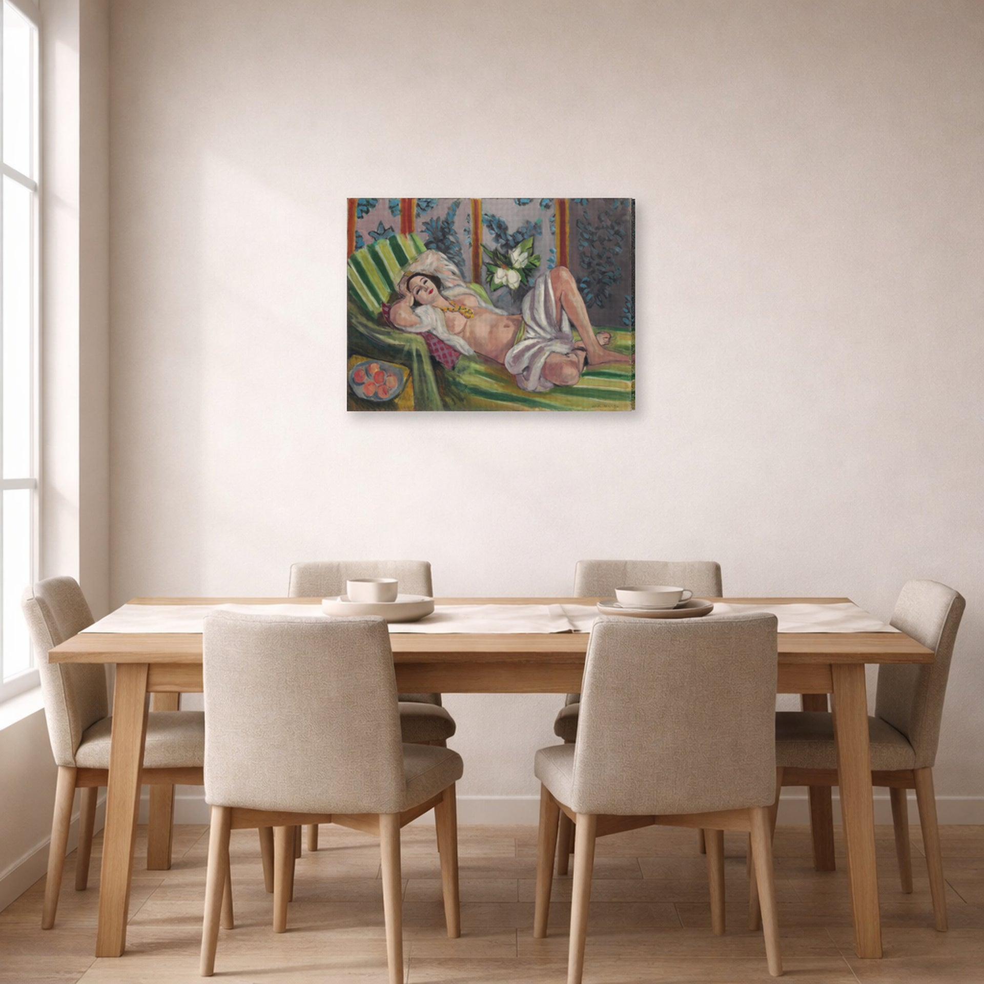 Gallery-wrapped canvas print of Henri Matisse's Odalisque Couchee Aux Magnolias hanging on a dining room wall