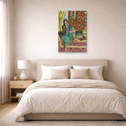 Gallery-wrapped canvas print of Henri Matisse's Odalisque Sitting With Board hanging above a bed in a bedroom