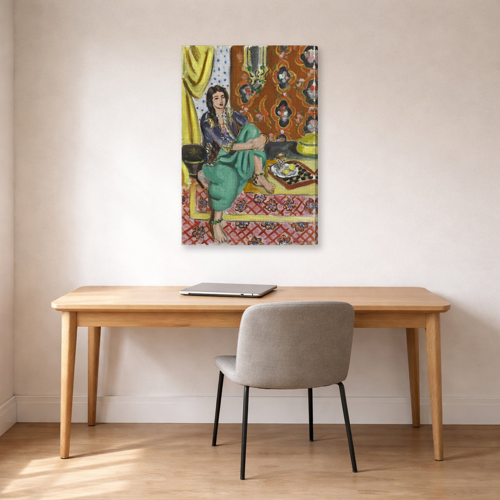 Gallery-wrapped canvas print of Henri Matisse's Odalisque Sitting With Board hanging in a home office
