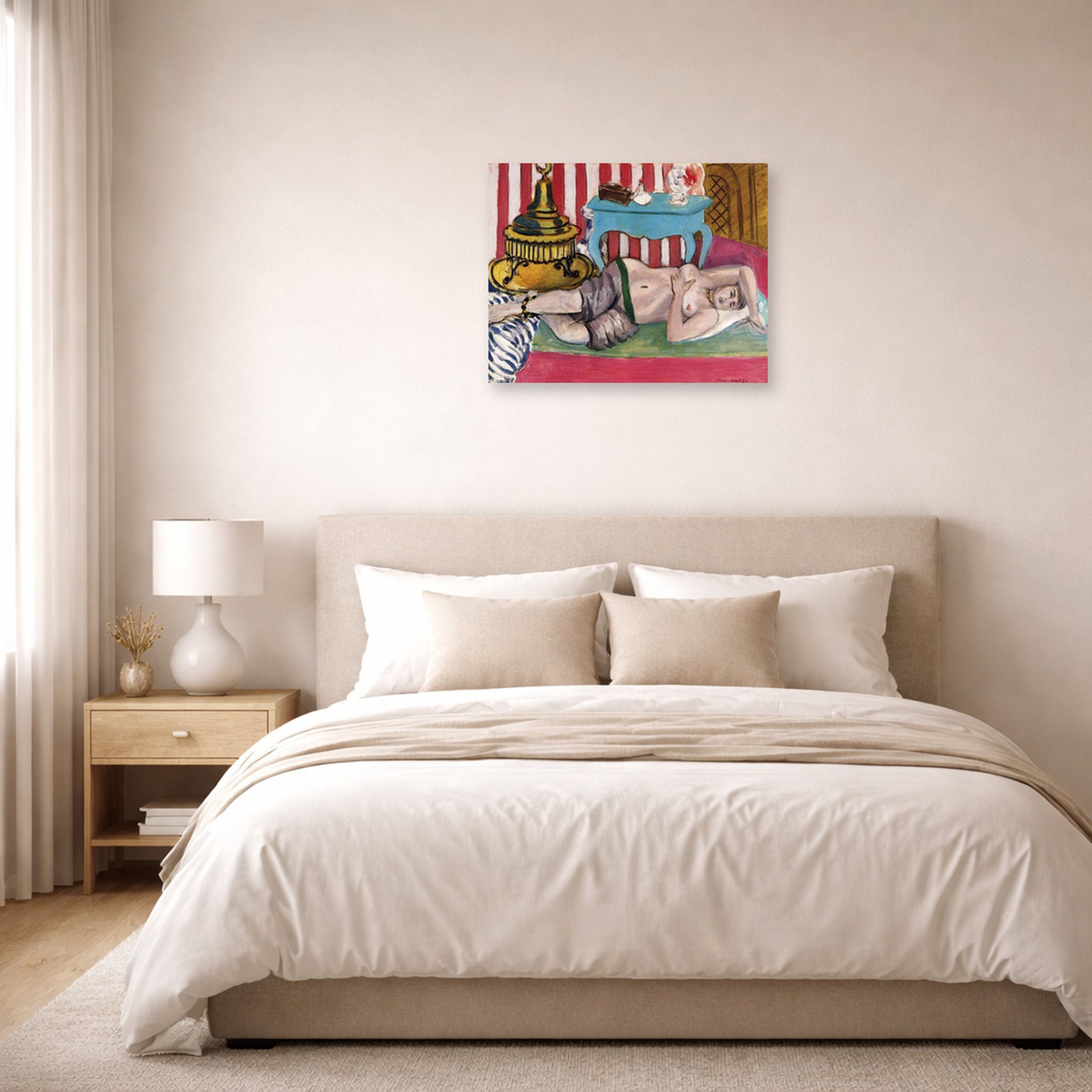 Unframed poster print of Henri Matisse's Odalisque with Green Scarf displayed above a bed in a bedroom