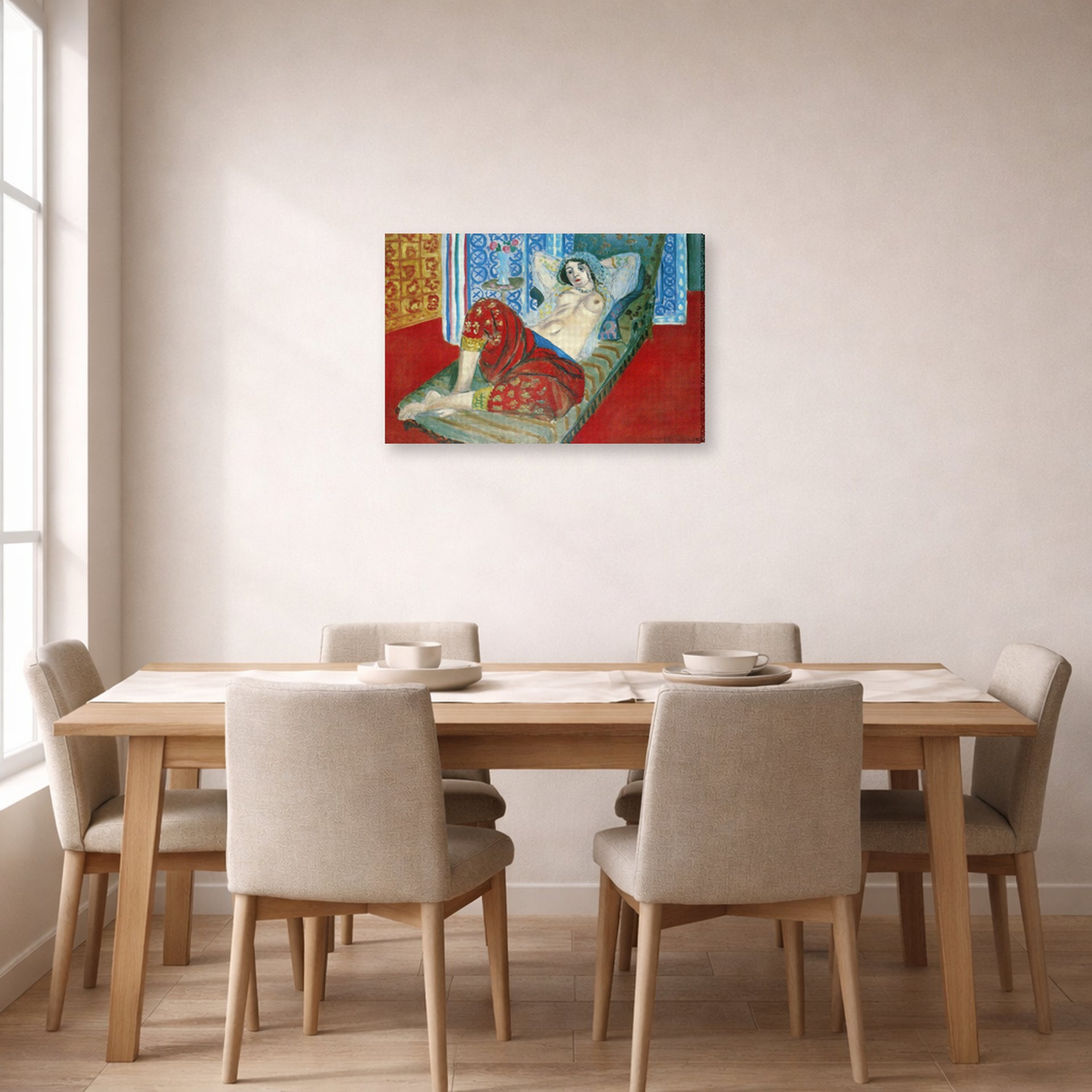Gallery-wrapped canvas print of Henri Matisse's Odalisque in Red Culottes hanging on a dining room wall