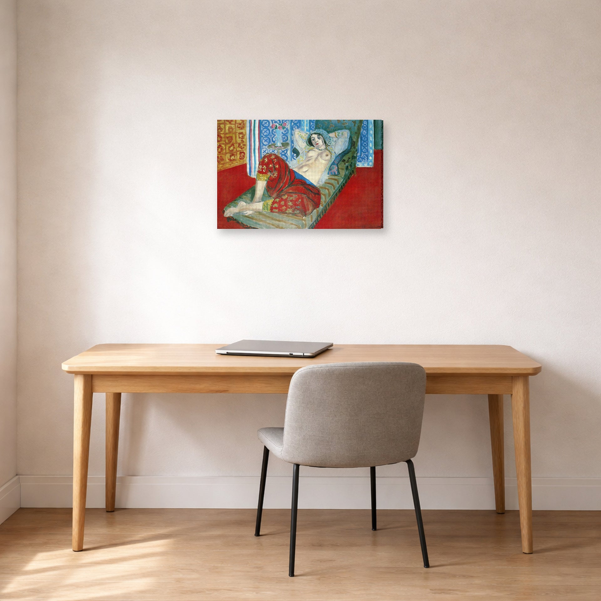 Gallery-wrapped canvas print of Henri Matisse's Odalisque in Red Culottes hanging in a home office