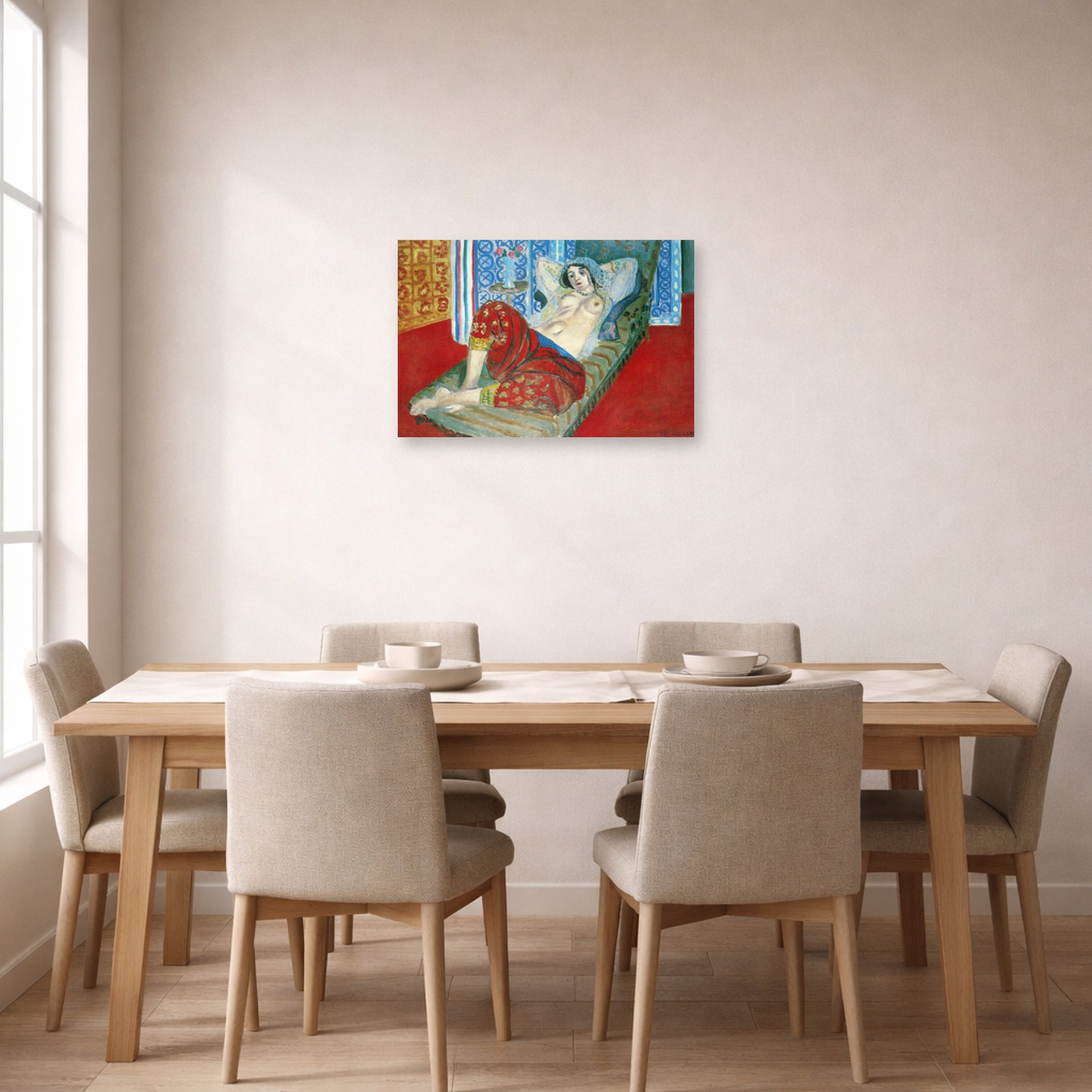 Unframed poster print of Henri Matisse's Odalisque in Red Culottes displayed on a dining room wall