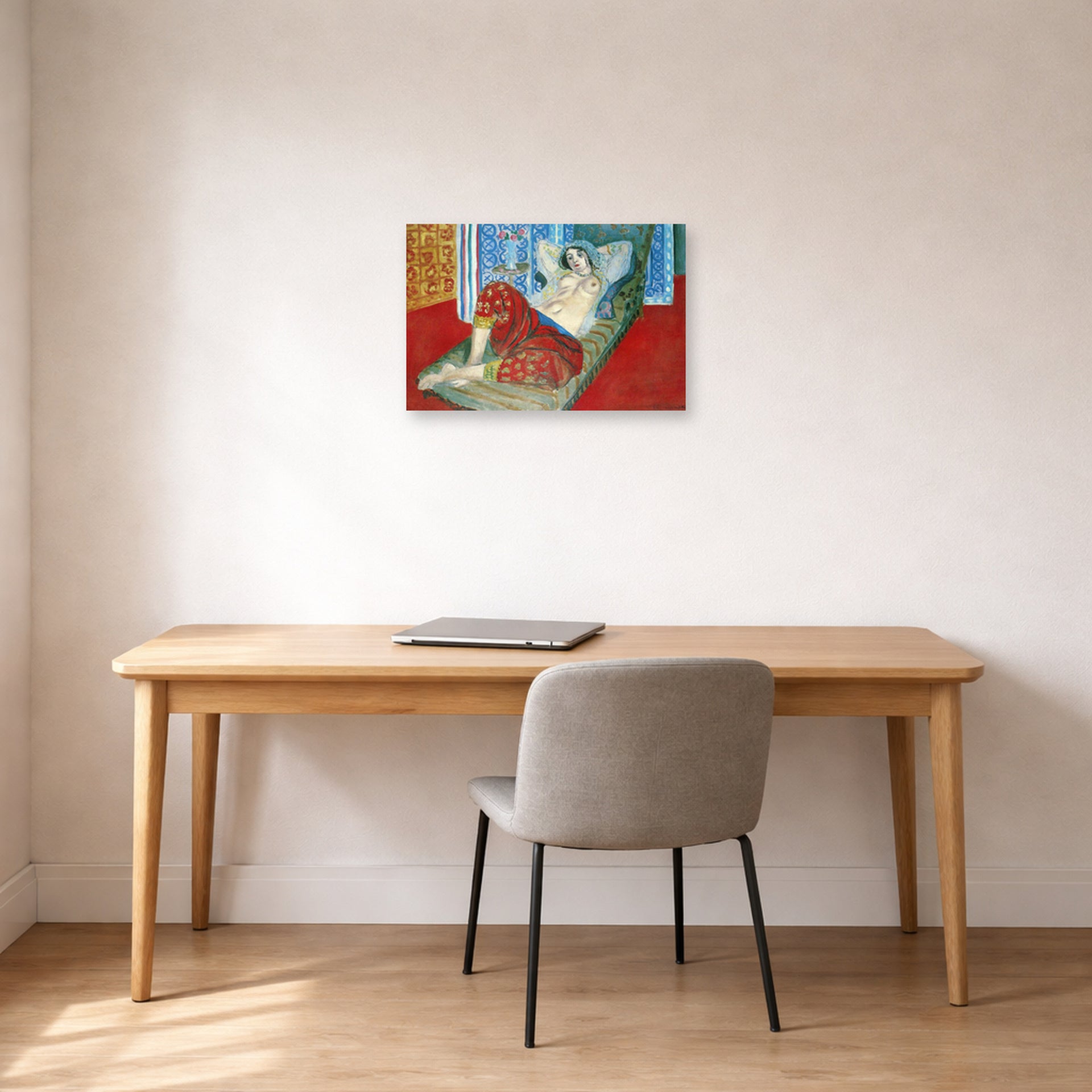 Unframed poster print of Henri Matisse's Odalisque in Red Culottes displayed in a home office