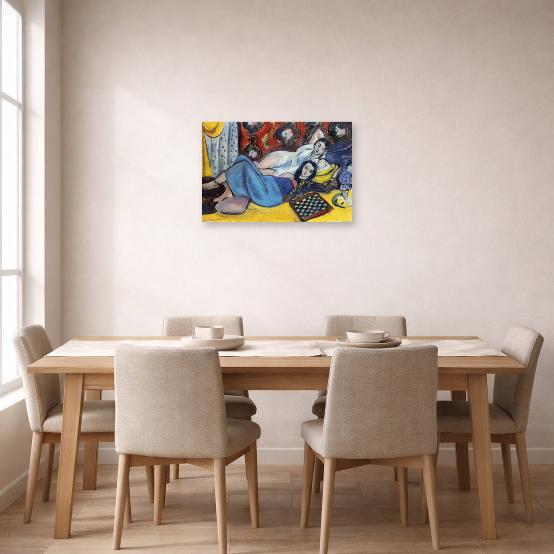 Unframed poster print of Henri Matisse's Odalisques displayed on a dining room wall