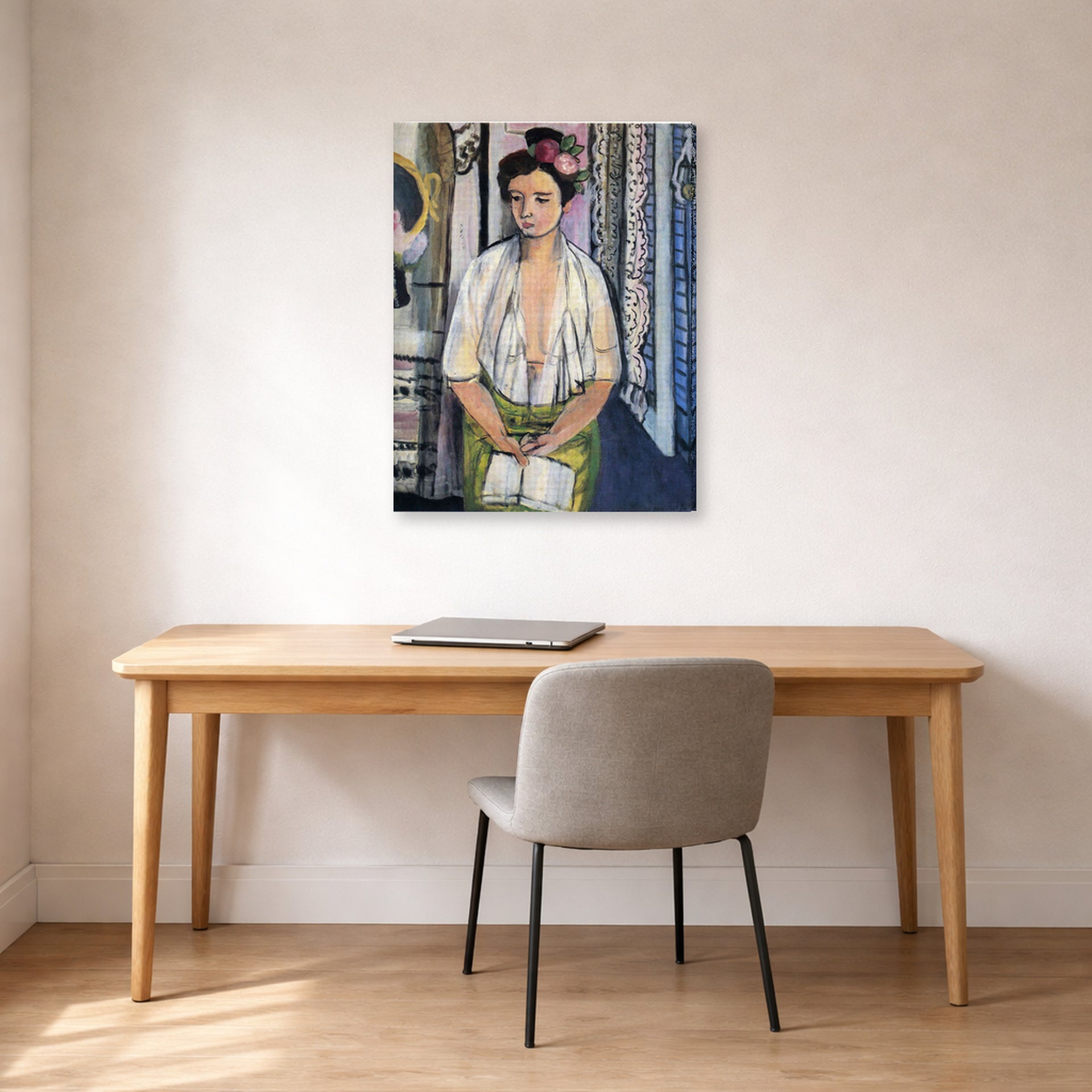 Gallery-wrapped canvas print of Henri Matisse's Reader on a Black Background hanging in a home office