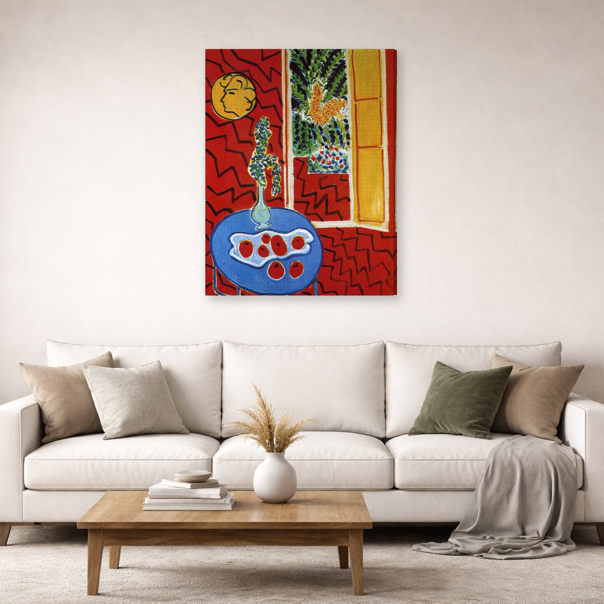 Gallery-wrapped canvas print of Henri Matisse's Red Interior Still Life on a Blue Table hanging in a living room, view 2
