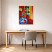 Gallery-wrapped canvas print of Henri Matisse's Red Interior Still Life on a Blue Table hanging in a home office