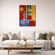 Unframed poster print of Henri Matisse's Red Interior Still Life on a Blue Table displayed in a living room, view 2