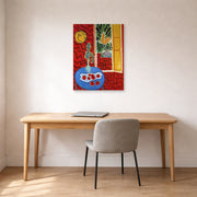 Unframed poster print of Henri Matisse's Red Interior Still Life on a Blue Table displayed in a home office