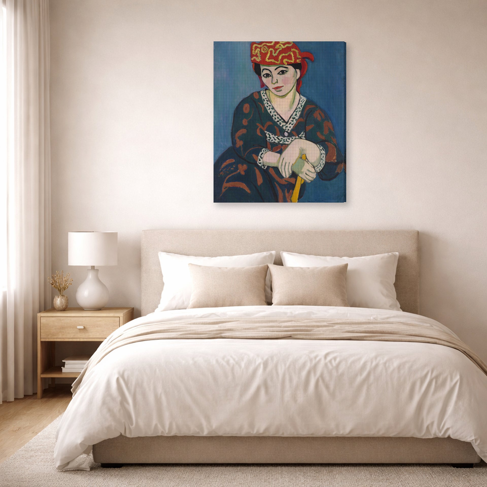 Gallery-wrapped canvas print of Henri Matisse's Red Madras Headdress hanging above a bed in a bedroom