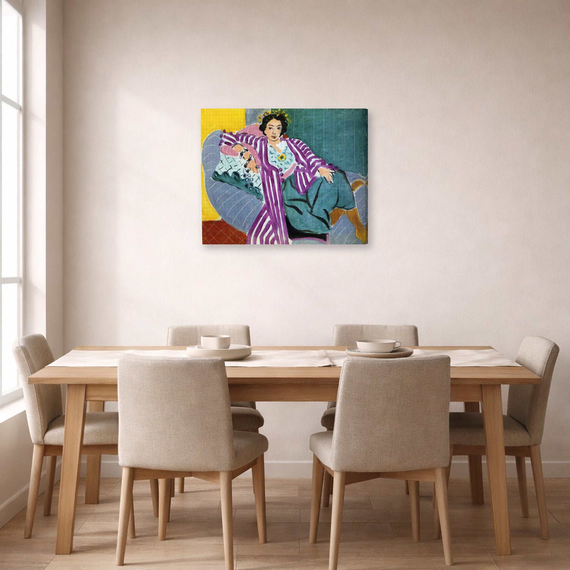 Gallery-wrapped canvas print of Henri Matisse's Small Odalisque in Purple Robe hanging on a dining room wall