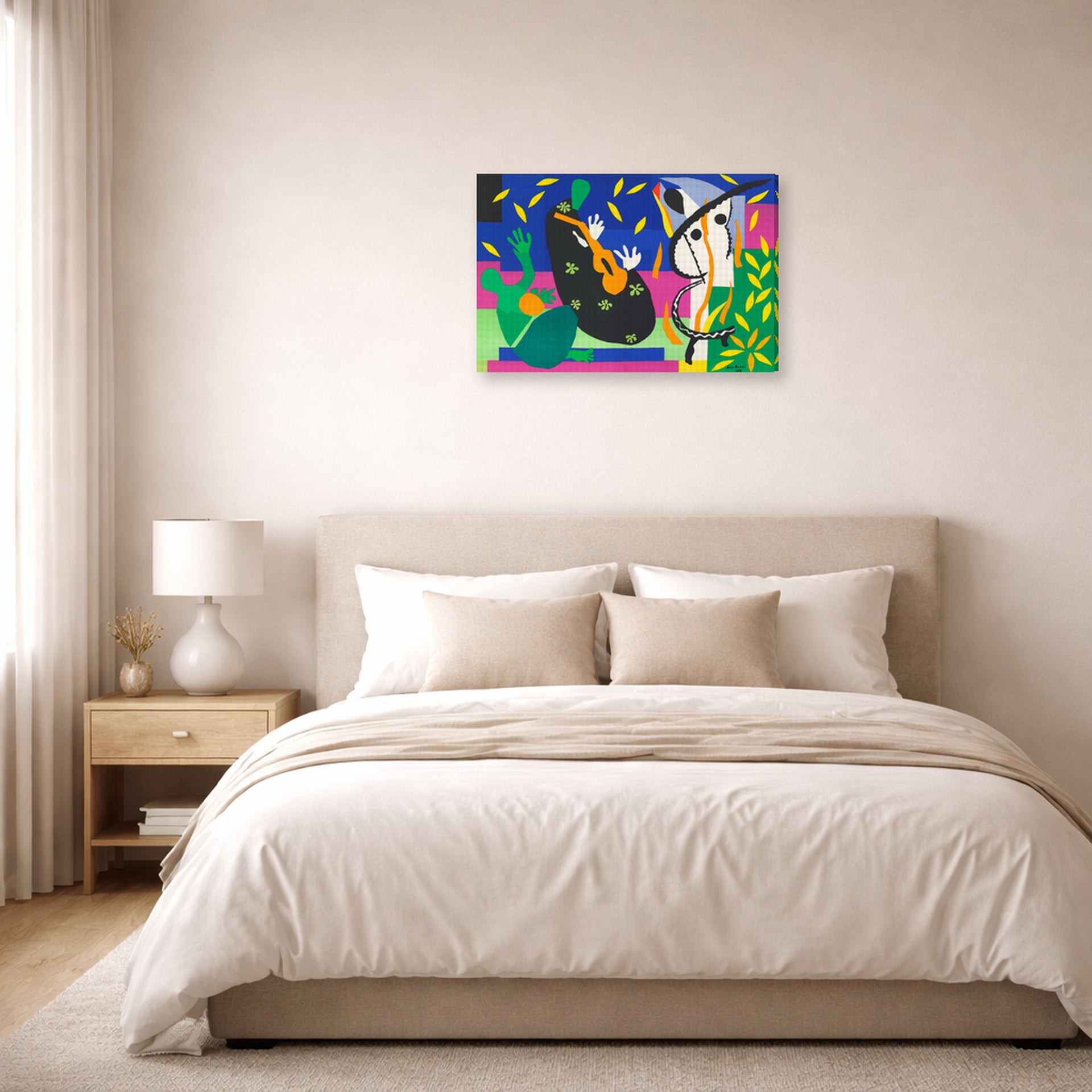 Gallery-wrapped canvas print of Henri Matisse's Sorrow of the King hanging above a bed in a bedroom