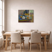 Gallery-wrapped canvas print of Henri Matisse's Still Life Compote, Apples, and Oranges hanging on a dining room wall