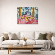 Gallery-wrapped canvas print of Henri Matisse's Still Life with Apples on a Pink Tablecloth hanging in a living room, view 2