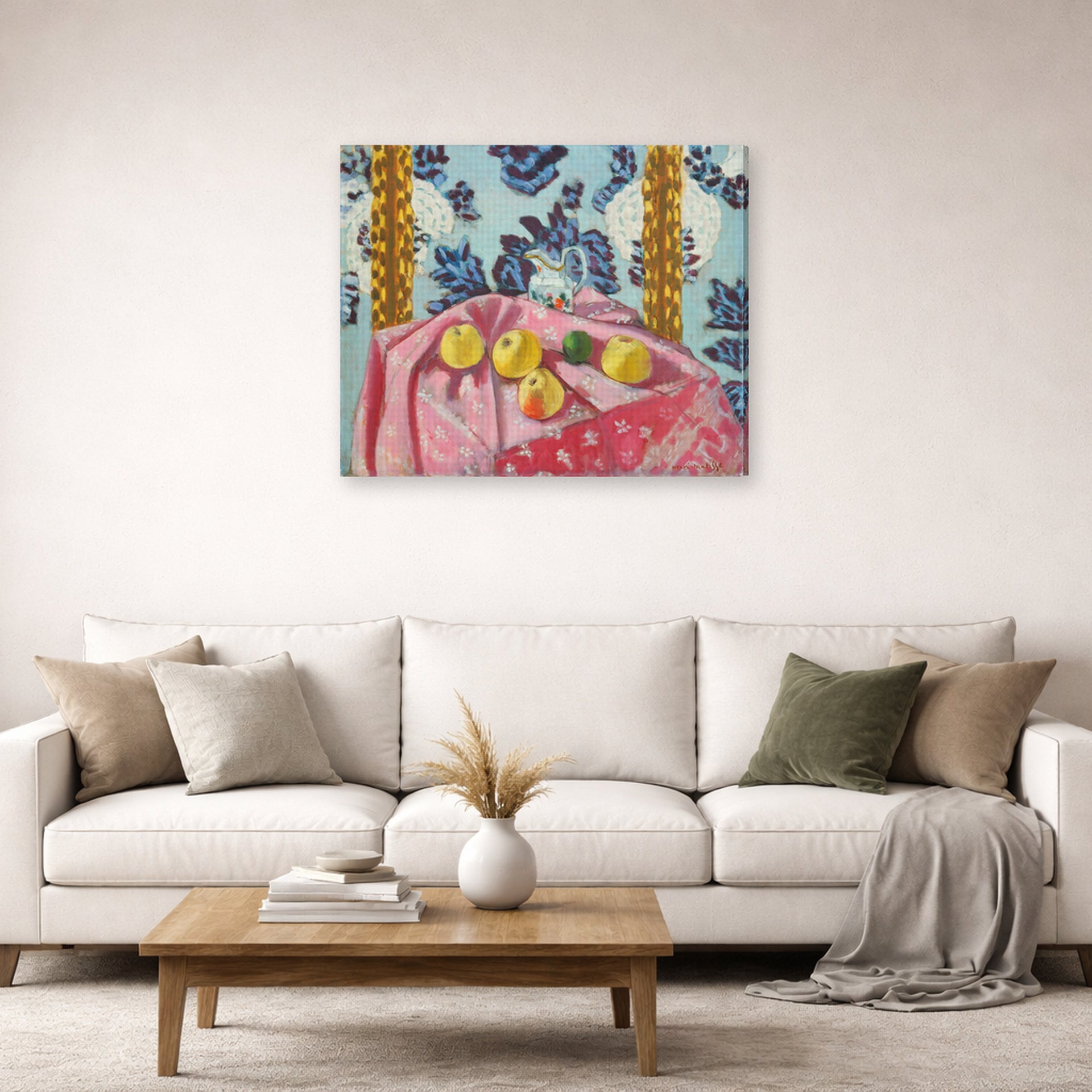 Gallery-wrapped canvas print of Henri Matisse's Still Life with Apples on a Pink Tablecloth hanging in a living room, view 2