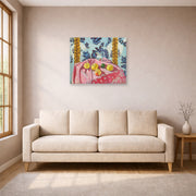 Unframed poster print of Henri Matisse's Still Life with Apples on a Pink Tablecloth displayed in a living room, view 1