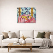 Unframed poster print of Henri Matisse's Still Life with Apples on a Pink Tablecloth displayed in a living room, view 2