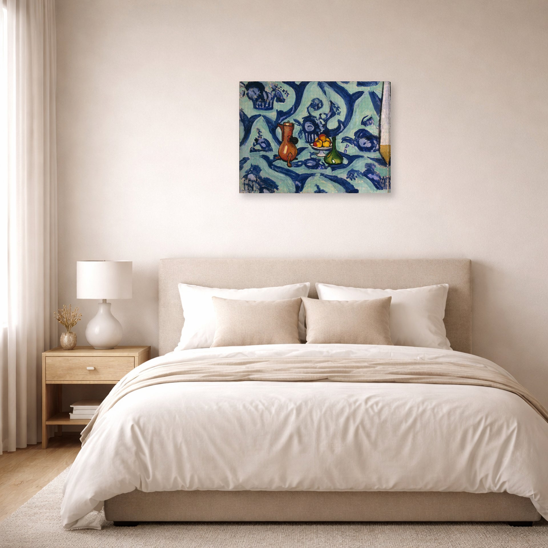 Gallery-wrapped canvas print of Henri Matisse's Still Life with Blue Tablecloth hanging above a bed in a bedroom