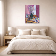 Gallery-wrapped canvas print of Henri Matisse's Still Life with Flowers hanging above a bed in a bedroom