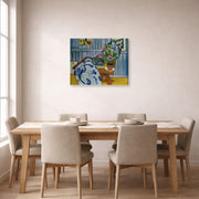 Gallery-wrapped canvas print of Henri Matisse's Still Life with Geraniums hanging on a dining room wall