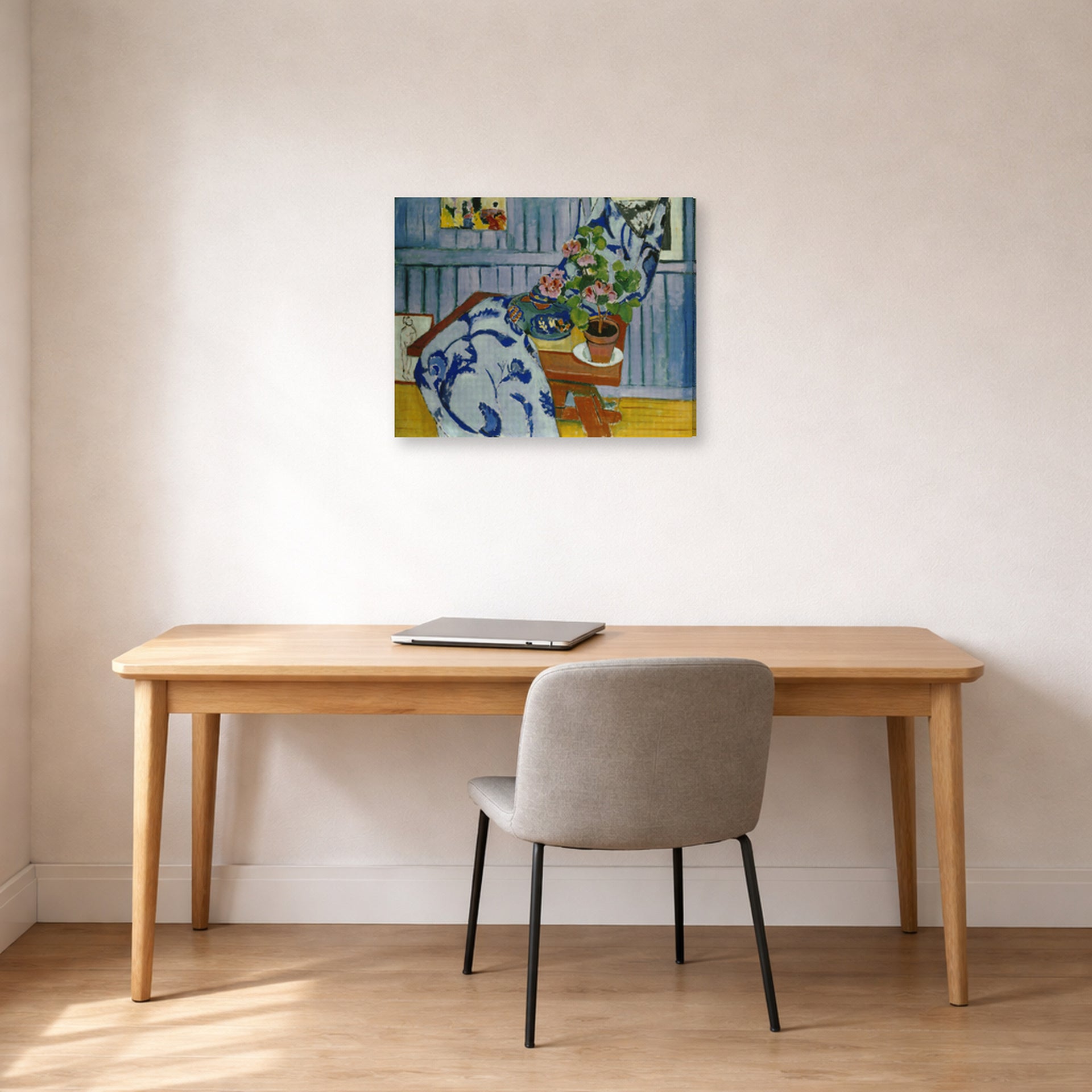Gallery-wrapped canvas print of Henri Matisse's Still Life with Geraniums hanging in a home office