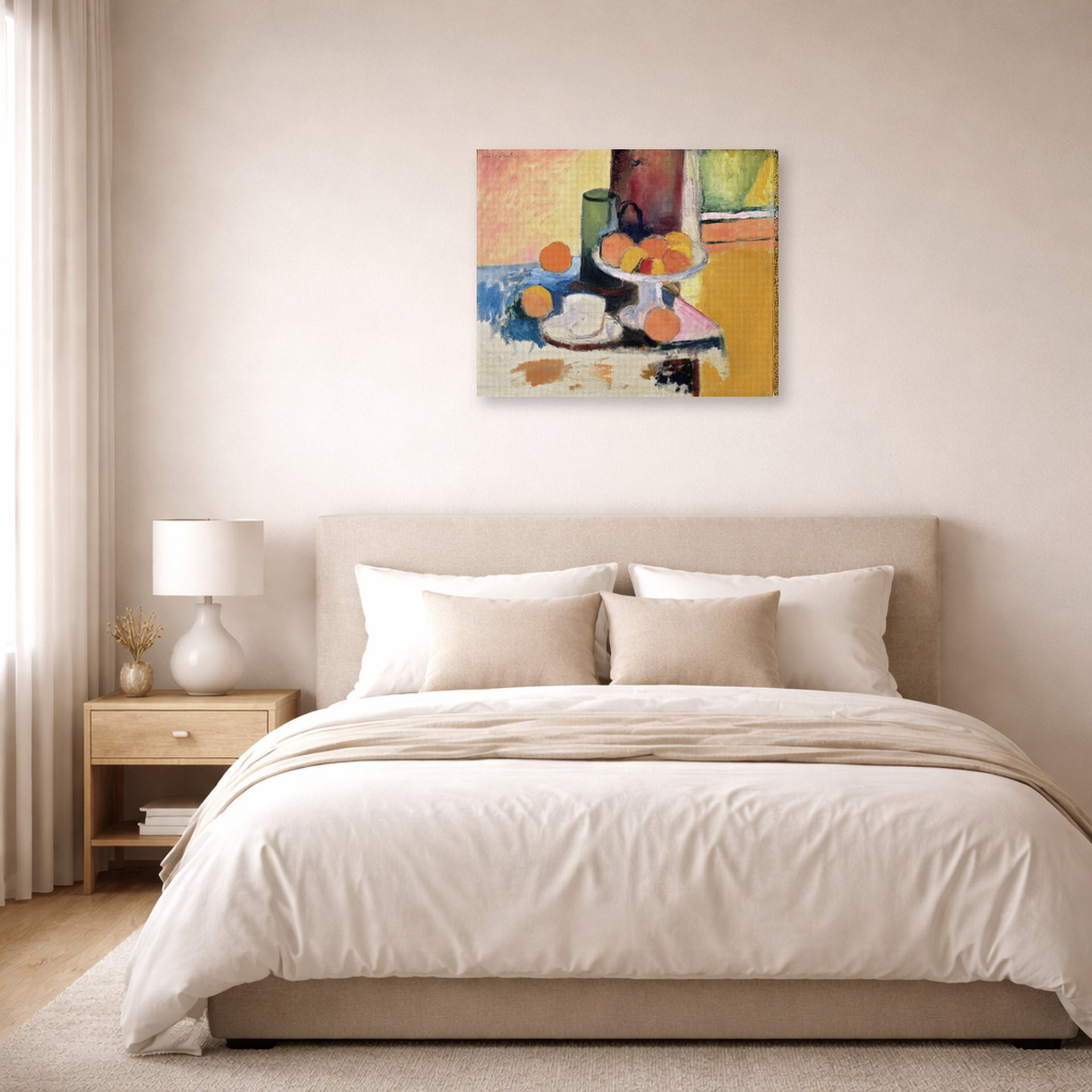 Gallery-wrapped canvas print of Henri Matisse's Still Life with Oranges hanging above a bed in a bedroom