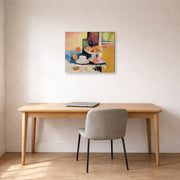 Gallery-wrapped canvas print of Henri Matisse's Still Life with Oranges hanging in a home office
