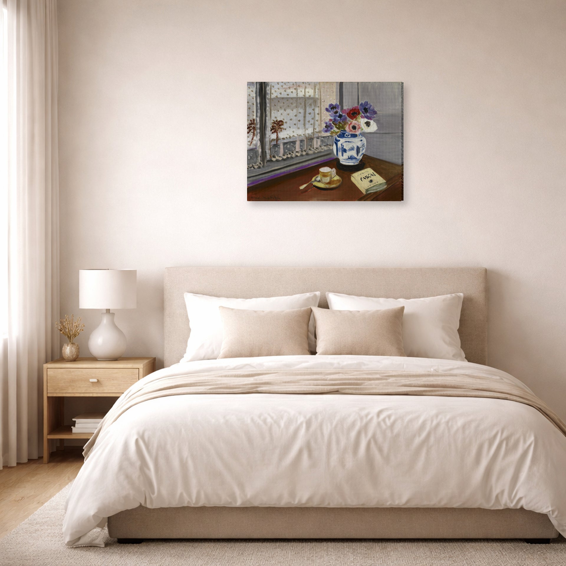 Gallery-wrapped canvas print of Henri Matisse's Still Life with Pascal's Pensees hanging above a bed in a bedroom