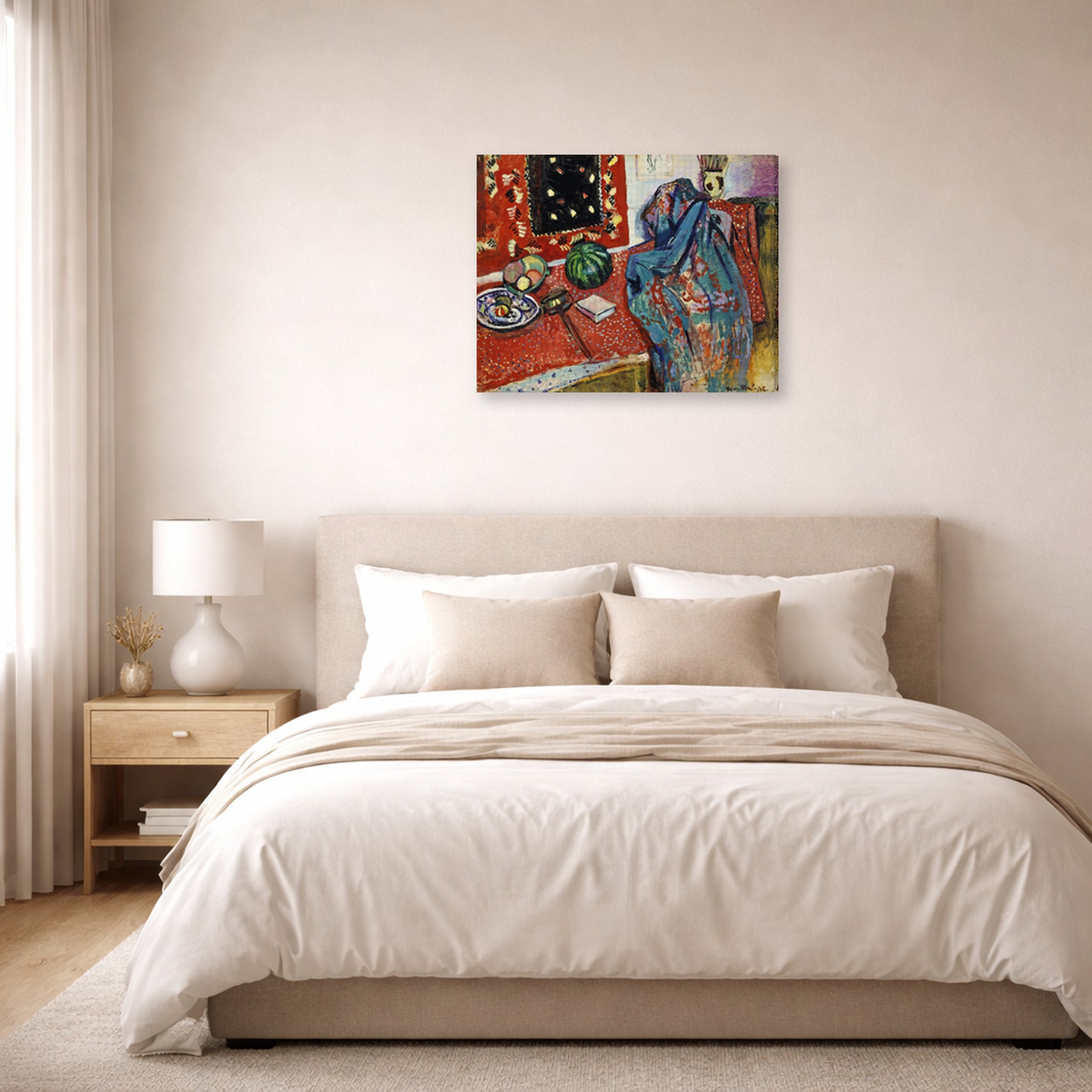 Gallery-wrapped canvas print of Henri Matisse's Still Life with a Red Rug hanging above a bed in a bedroom