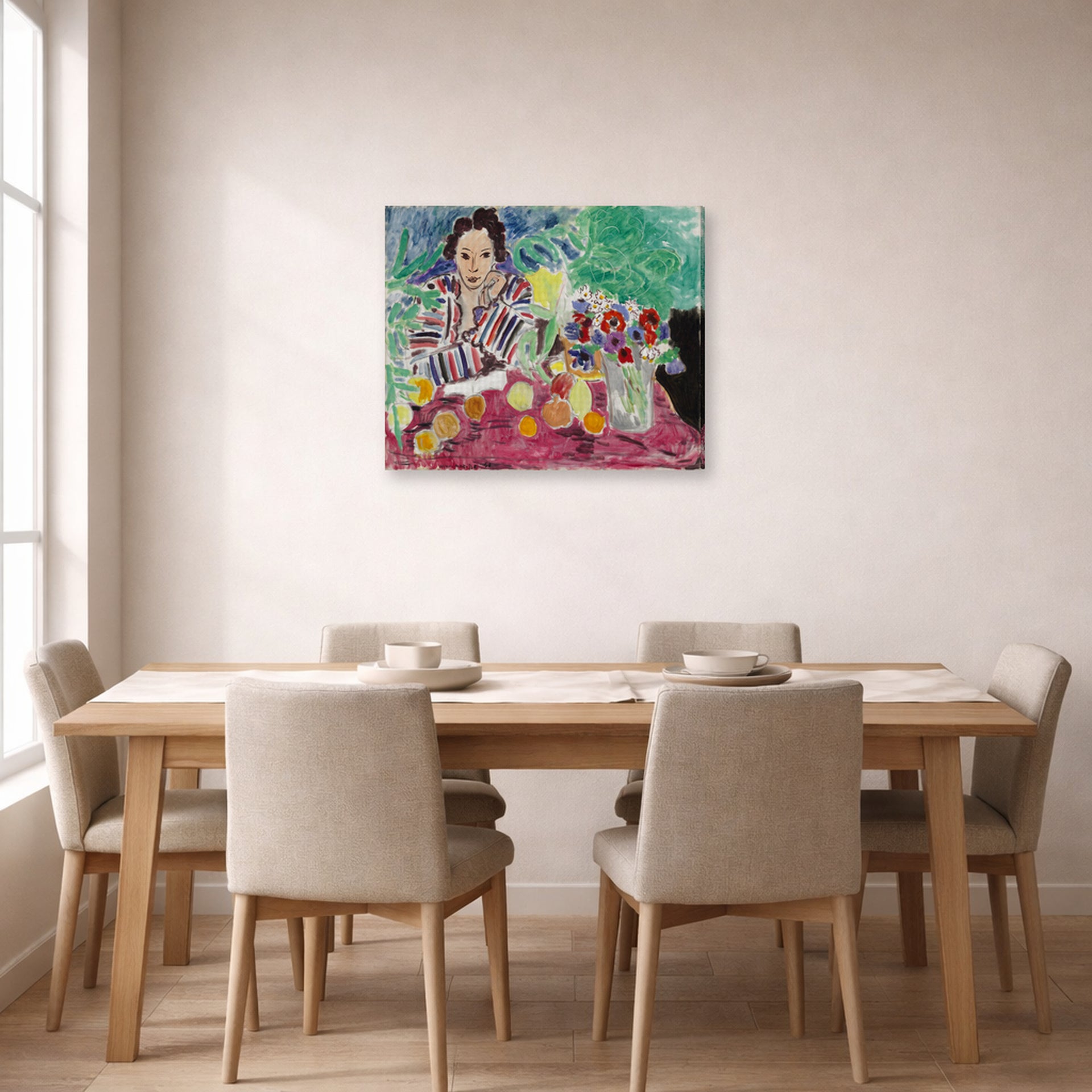Gallery-wrapped canvas print of Henri Matisse's Striped Robe, Fruit and Anemones hanging on a dining room wall
