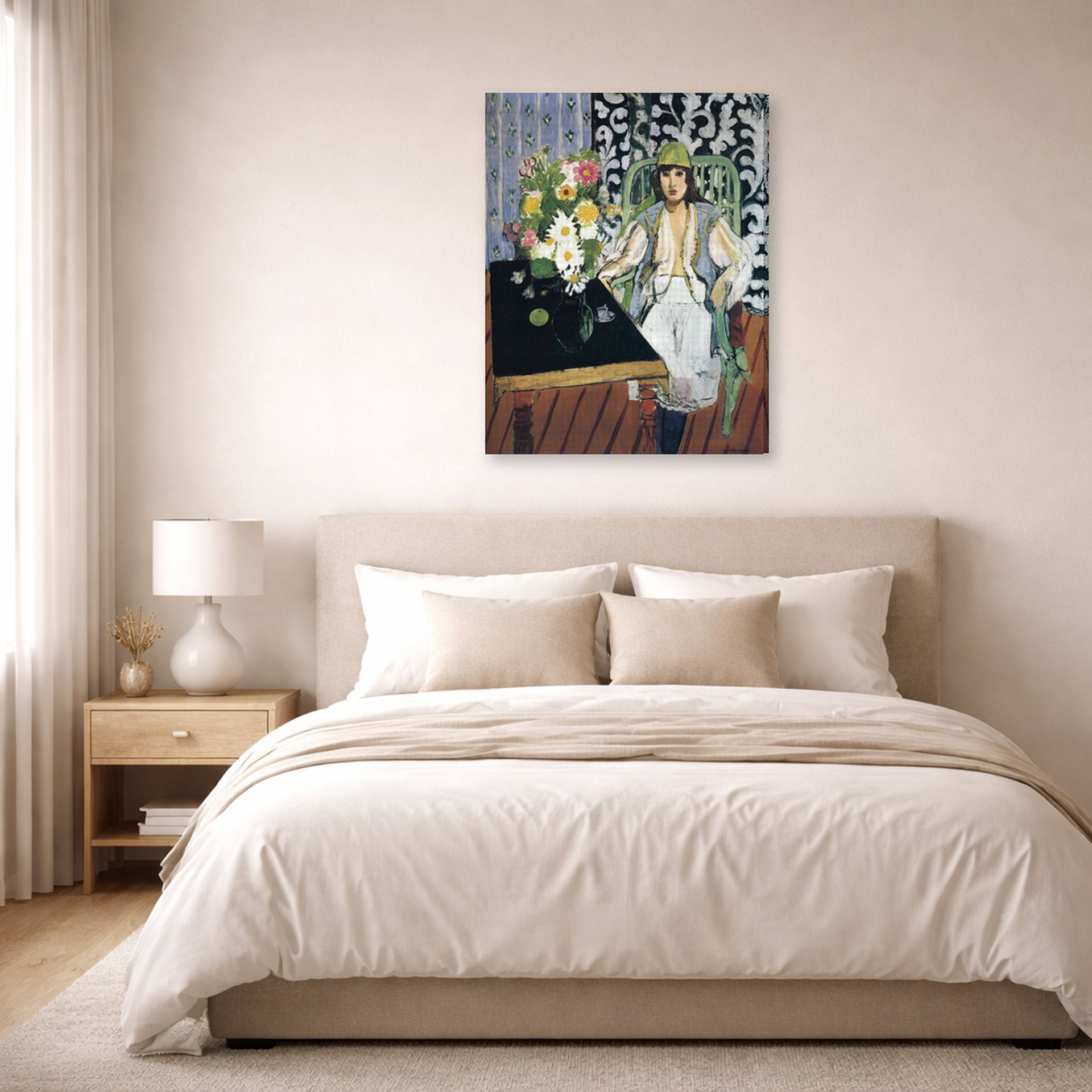 Gallery-wrapped canvas print of Henri Matisse's The Black Table hanging above a bed in a bedroom