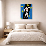 Gallery-wrapped canvas print of Henri Matisse's The Fall of Icarus hanging above a bed in a bedroom