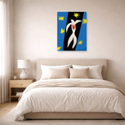 Unframed poster print of Henri Matisse's The Fall of Icarus displayed above a bed in a bedroom