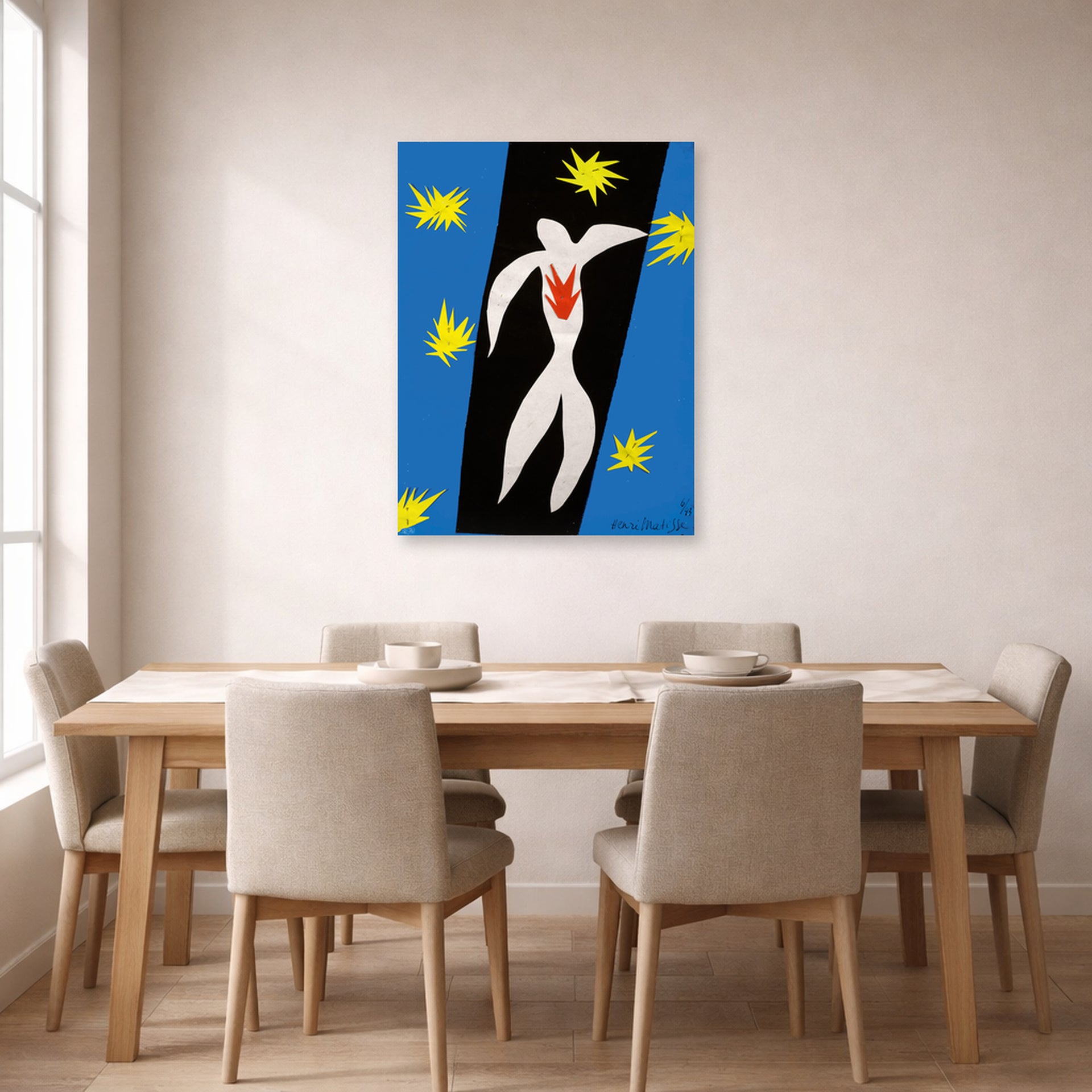 Unframed poster print of Henri Matisse's The Fall of Icarus displayed on a dining room wall