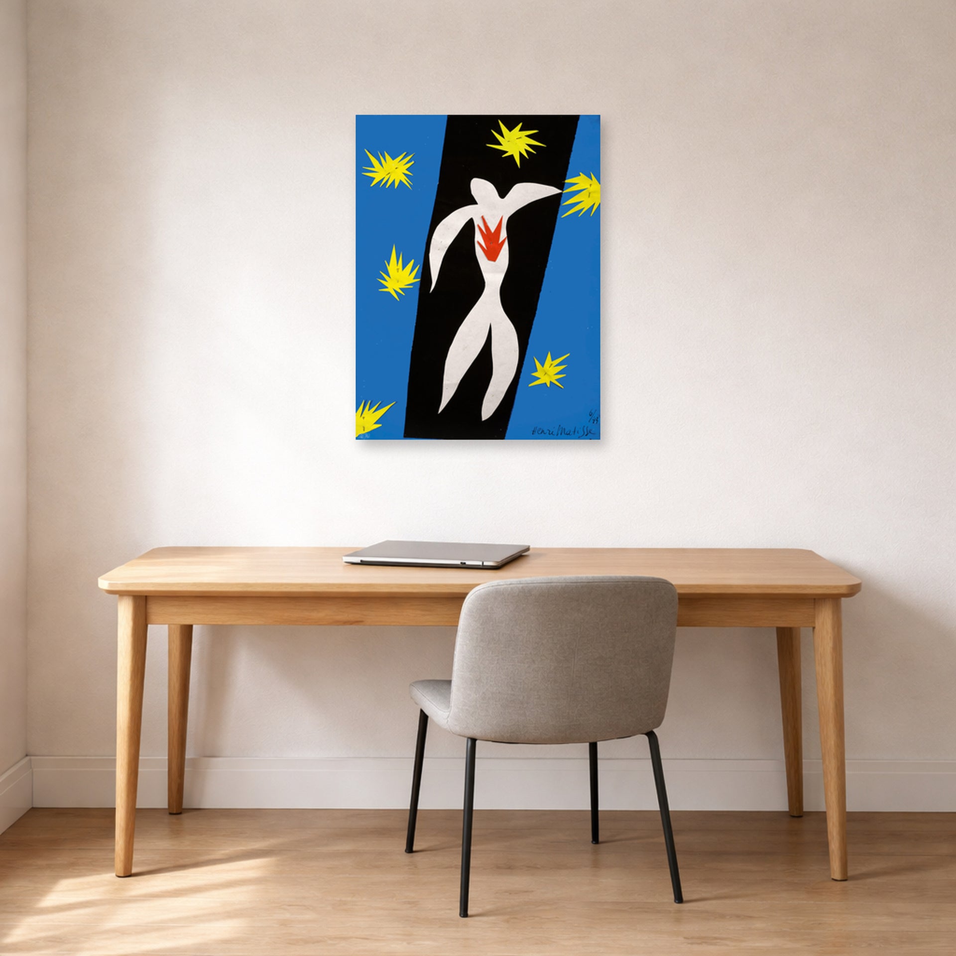 Unframed poster print of Henri Matisse's The Fall of Icarus displayed in a home office