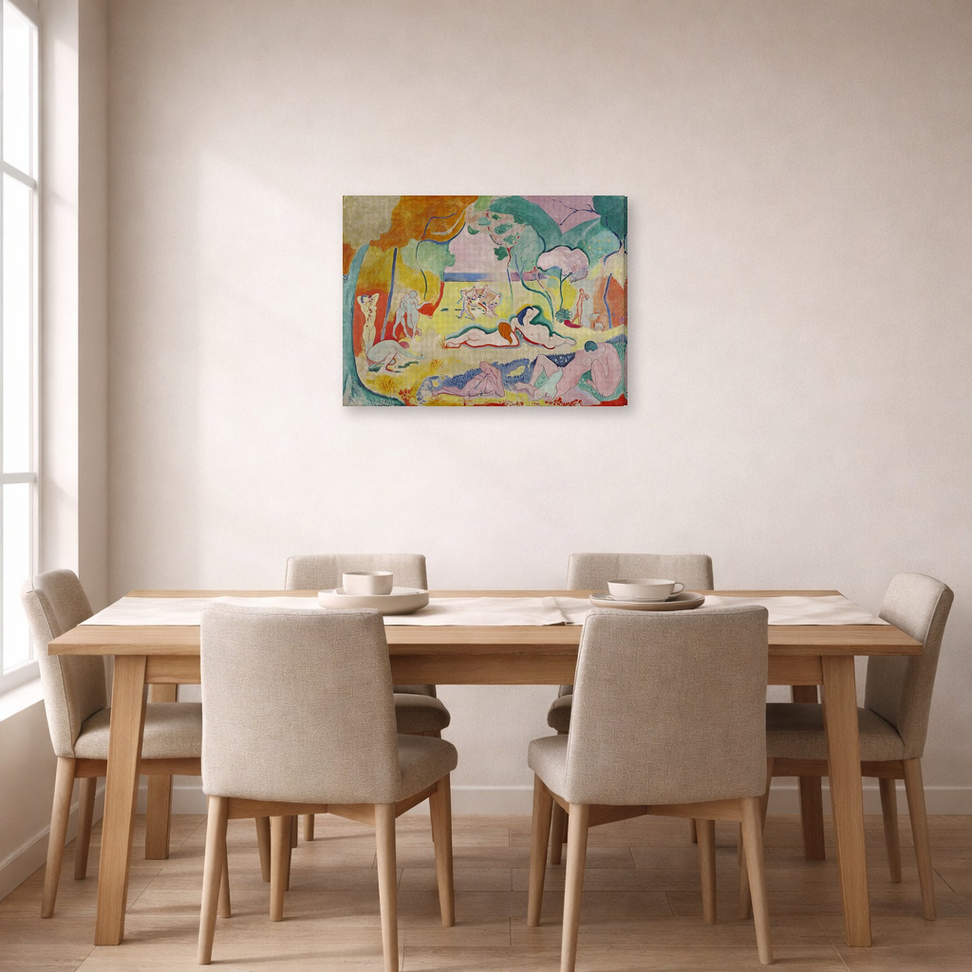 Gallery-wrapped canvas print of Henri Matisse's The Joy of Life hanging on a dining room wall