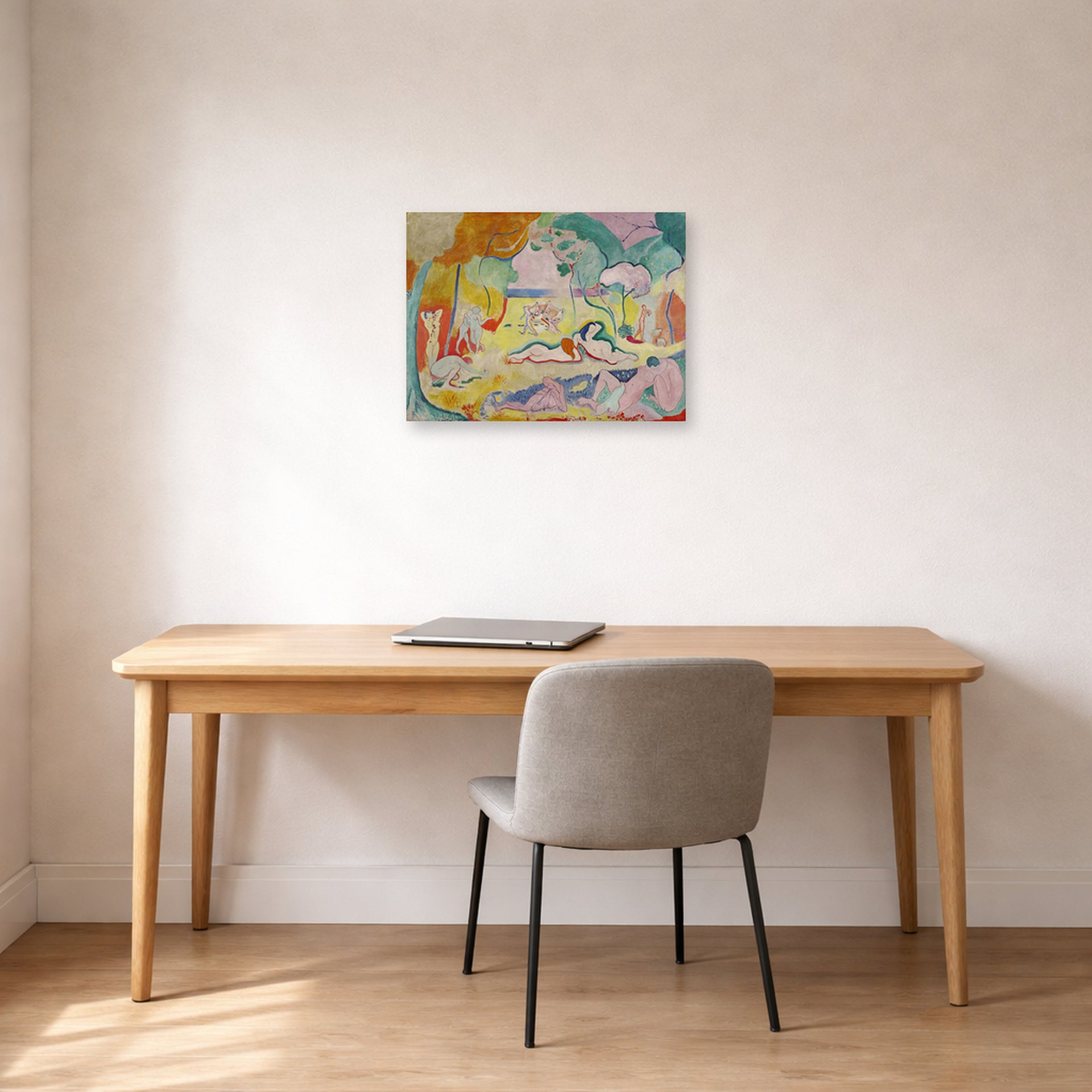 Unframed poster print of Henri Matisse's The Joy of Life displayed in a home office