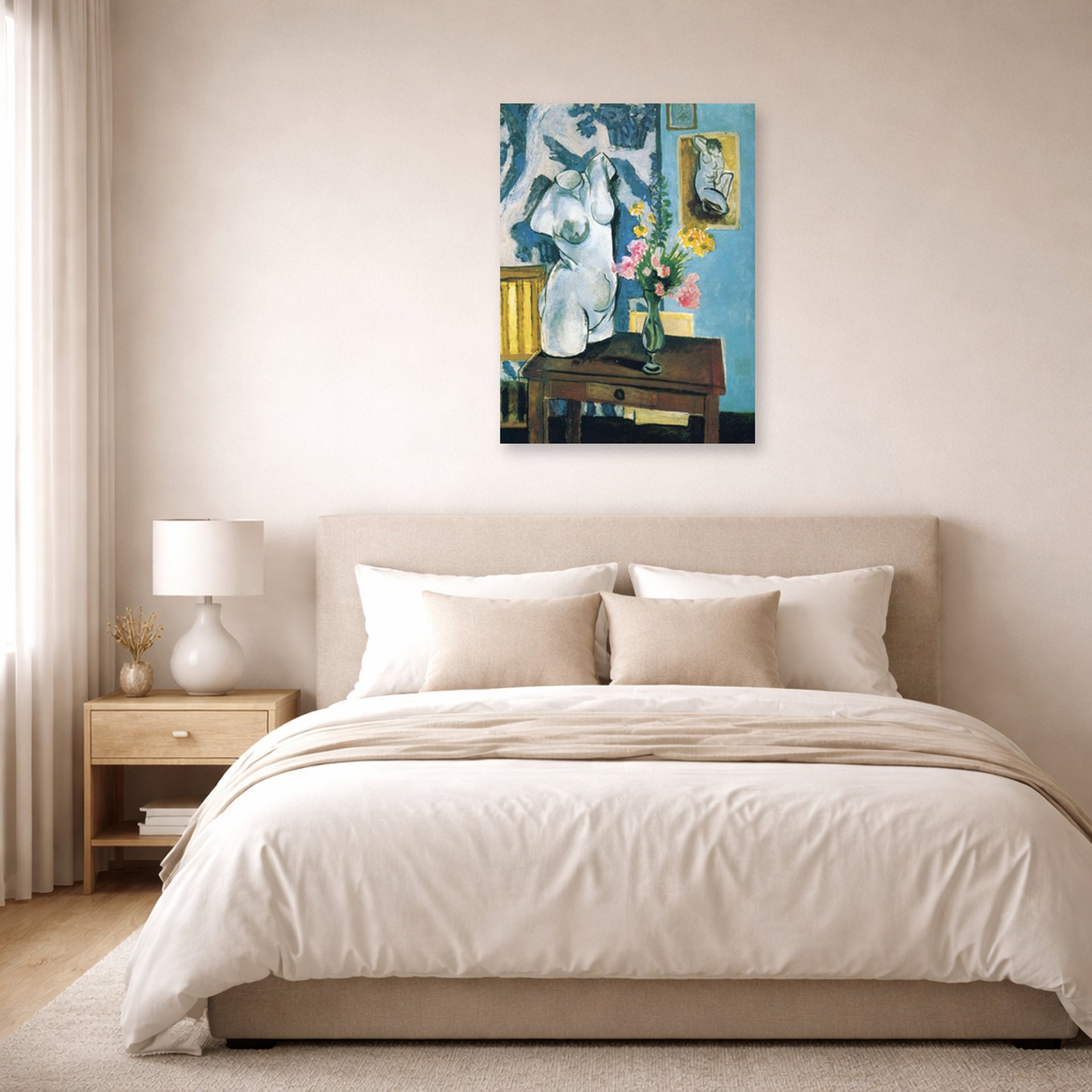 Unframed poster print of Henri Matisse's The Plaster Torso displayed above a bed in a bedroom