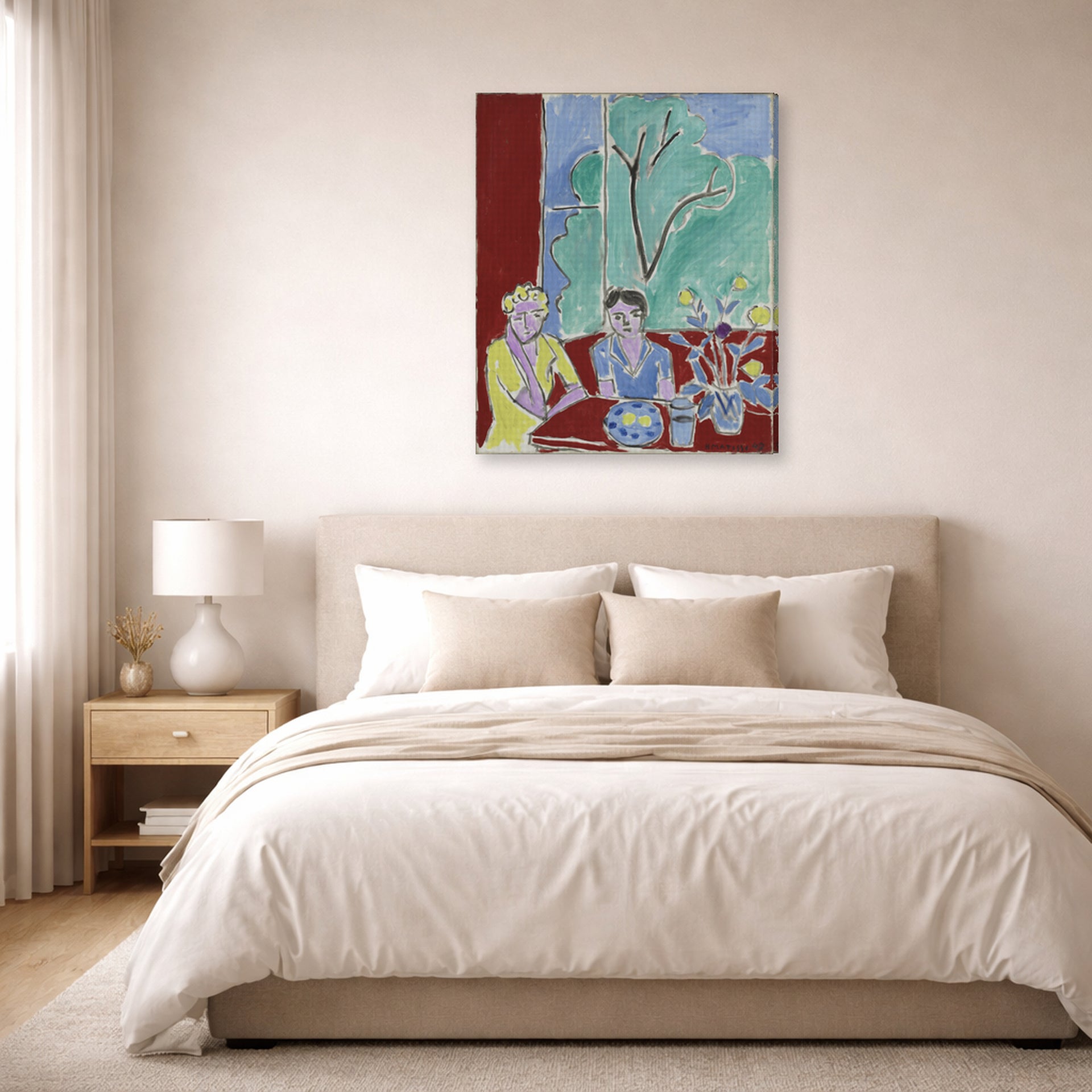 Gallery-wrapped canvas print of Henri Matisse's Two Girls, Red and Green Background hanging above a bed in a bedroom