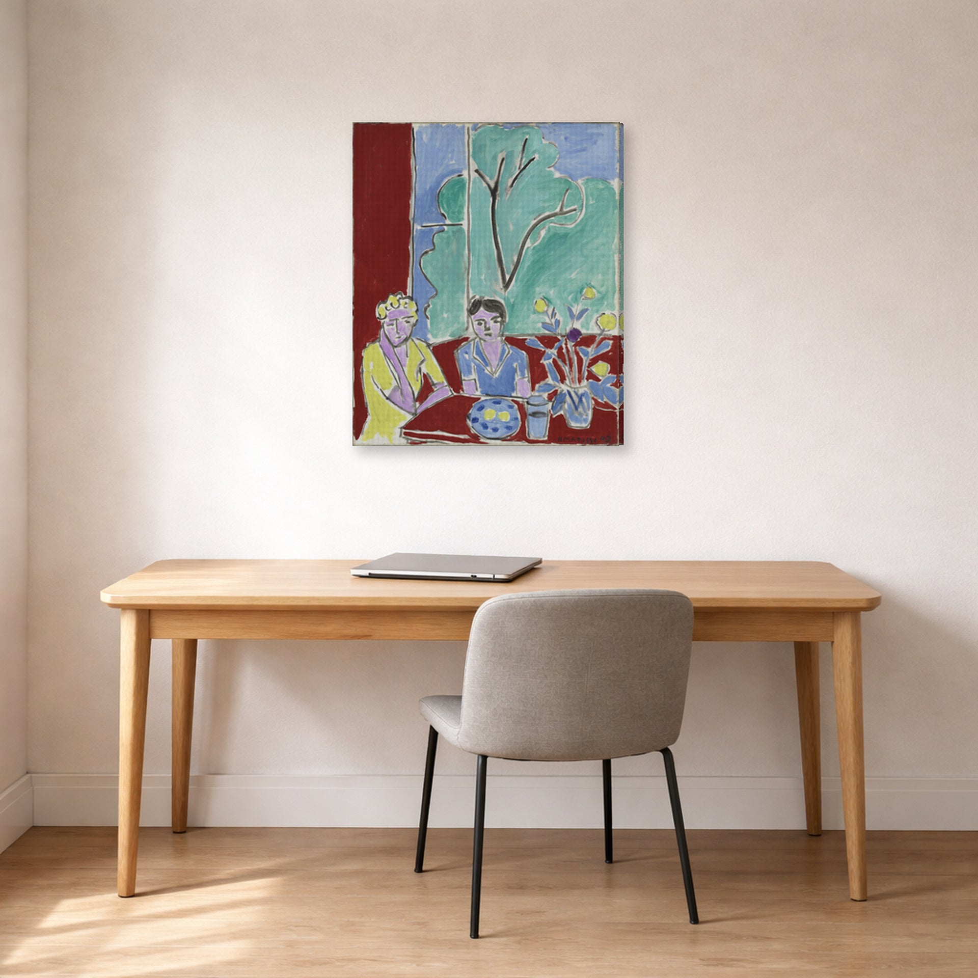 Gallery-wrapped canvas print of Henri Matisse's Two Girls, Red and Green Background hanging in a home office