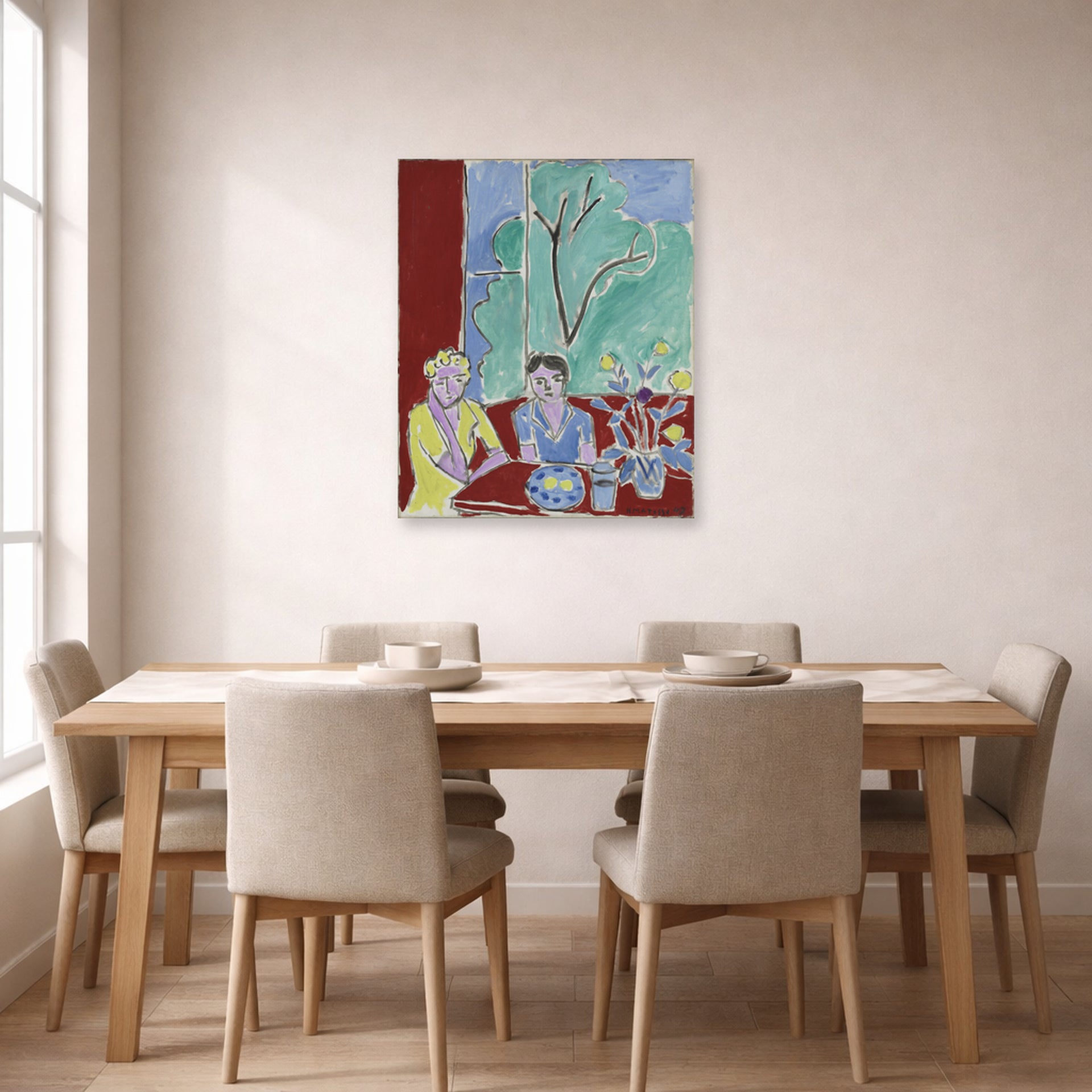 Unframed poster print of Henri Matisse's Two Girls, Red and Green Background displayed on a dining room wall