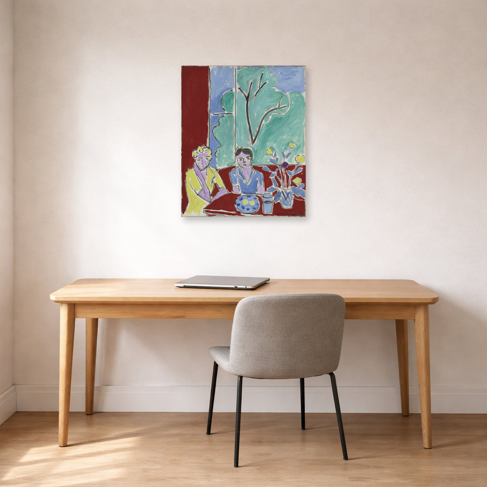 Unframed poster print of Henri Matisse's Two Girls, Red and Green Background displayed in a home office