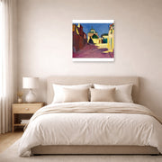 Unframed poster print of Henri Matisse's Une Rue a Arcueil displayed above a bed in a bedroom